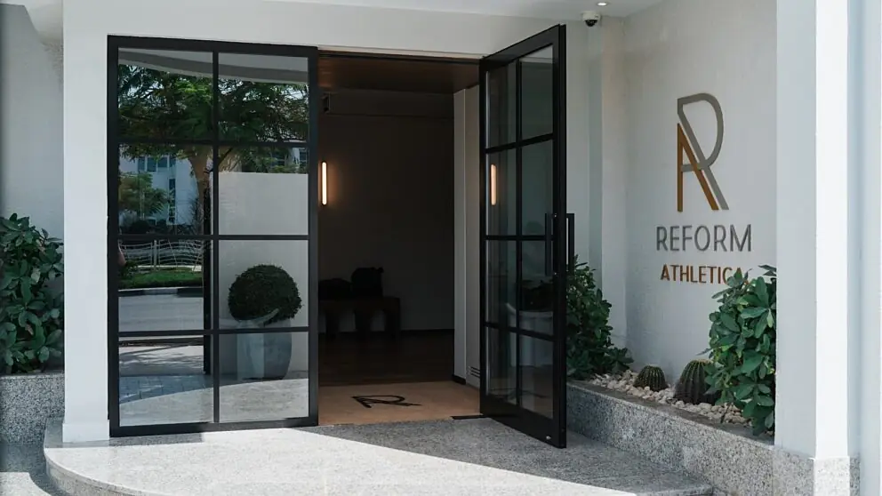 The Reform Athletica villa entrance and garden in Jumeirah 1